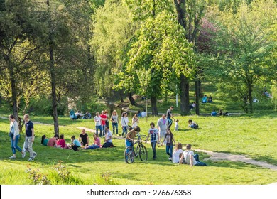 BUCHAREST, ROMANIA - MAY 08, 2015: People Having Picnic And Playing Games In Carol Public Park On Spring Day.