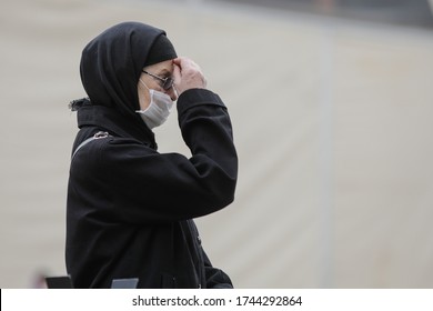 Bucharest, Romania - May 28, 2020: People Attend An Orthodox Church Service Outside The Patriarchal Palace With Social Distancing During The Covid-19 Outbreak.