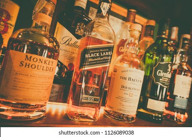 Bucharest Romania - May 8, 2018: Various bottles of alcohol are displayed in bar in Bucharest, Romania.