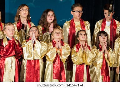 BUCHAREST, ROMANIA - NOVEMBER 04: unidentified members of the Carmina Tenera Children's Choir sing at the Week of Archangels Festival November 04, 2012 in Bucharest, Romania