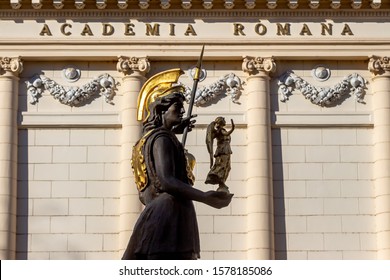 Bucharest, Romania - November 05, 2019: The statue of the goddess Minerva, made by sculptor Mihai Ecobici, is seen in front of The Romanian Academy, in Bucharest This image is for editorial use only.