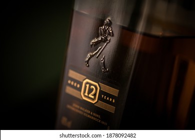 Bucharest, Romania - November 9, 2020: Illustrative editorial image of a Johnnie Walker Black Label blended scotch whisky bottle displayed in a pub in Bucharest, Romania.
