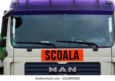 Bucharest, Romania - October 09, 2022: Driving School (scoala) Sign, Romanian Driving School Car Sign. Truck Driving School