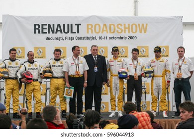 Bucharest, Romania, October 10, 2009: Pilots From The Renault Team Poses During A Press Conference On The Occasion Of Renault Road Show Held In Bucharest. 