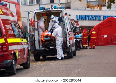 BUCHAREST, ROMANIA - October 24, 2021: An ambulance brings COVID-19 patient at the emergency ward of the biggest hospital in Bucharest, Emergency University Hospital.