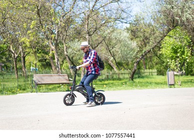 BUCHAREST, ROMANIA, - October 26, 2017: Man using a electrical bike in the park on a sunday. Illustrative editorial content.