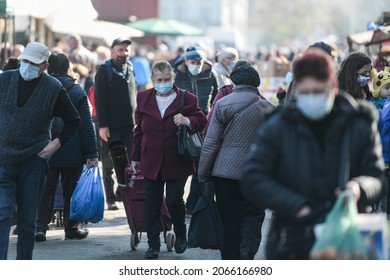 Bucharest, Romania – October 29, 2021: People wearing protective masks in Obor Market, during COVID-19 pandemic, in Bucharest, Romania.