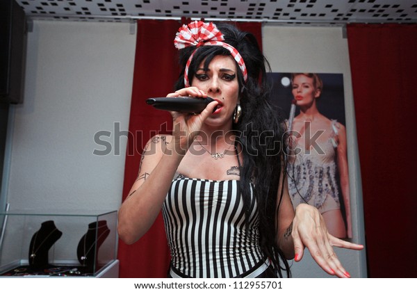 BUCHAREST, ROMANIA - SEPT 15: Merante Tamar van Amersfoort, official replica of singer Amy Winehouse, perform a concert at the event of reopening of a club in Bucharest, Saturday, August 15, 2012