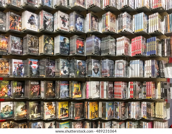 BUCHAREST, ROMANIA - SEPTEMBER 20, 2016: Classic\
And New Hollywood Production Movies On Dvd For Sale In\
Entertainment\
Center.