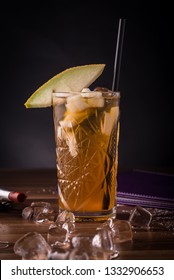 Bucharest, Romania-FEB,23, 2019: Colour Cocktail on dark wooden background. Editorial content only - Shutterstock ID 1332906653