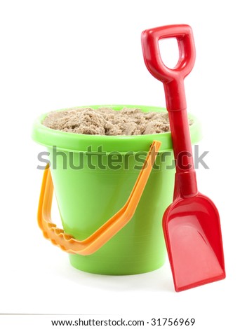 bucket and spade close up on white background
