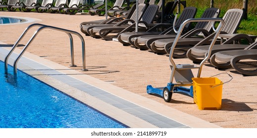 Bucket And Trolley For Pool Cleaning. Concept Photo  Pool Cleaning, Hotel Staff, Service.