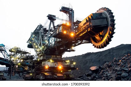 Bucket wheel excavator in a coal mine. Extraction of minerals.