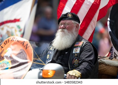 Buckhannon, West Virginia, USA - May 18, 2019: Strawberry Festival, Member Of The American Legion Riders On A Motorcycle, Transporting The American Flag During The Parade