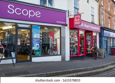 BUCKINGHAM, UK - December 04, 2019. Charity Shops Scope And British Heart Foundation On A Typical English High Street, UK