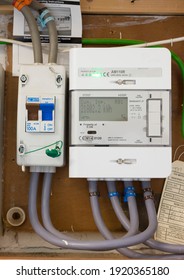 BUCKINGHAM, UK - October 23, 2020. Smart Electricity Meter, EON Domestic Electric Meter And Main Switch In A Home Electric Box