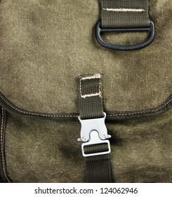 Buckle On The Old Green Backpack