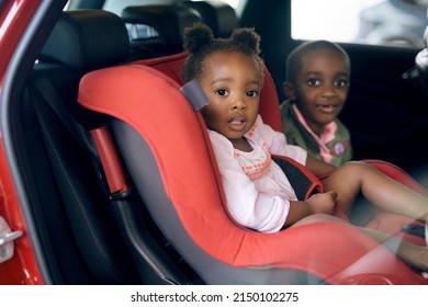 Buckle Up. Cropped Portrait Of A Young Brother And Sister Sitting In A Carseat.