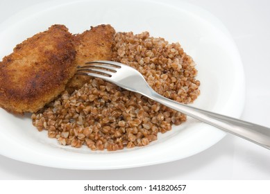 Buckwheat And Cutlets In Plate