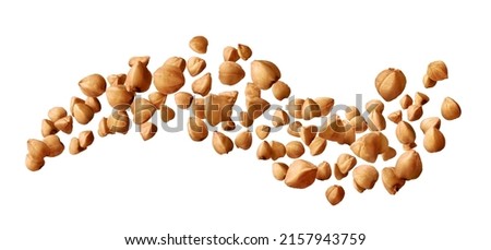 Buckwheat groats flying isolated on white background