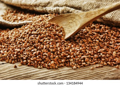 Buckwheat Groats And Wooden Spoon