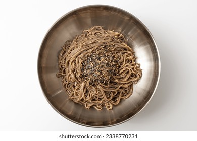Buckwheat noodles in perilla oil on a white background
