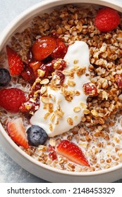 Buckwheat Porridge With Milk And Fresh Berries. Overhead View, Close Up