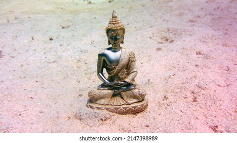 Buda Statue On The Red Sea Sand Bottom