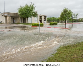 Buda, TX/USA - March 29 2018: Road Flooded With Rainwater