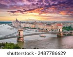 Budapest city evening scene. View at Chain bridge, river Danube and famous building of Parliament. Location: Budapest, Hungary, Europe.