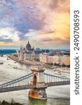 Budapest city evening scene. View at Chain bridge, river Danube and famous building of Parliament. Location: Budapest, Hungary, Europe.