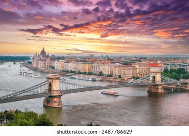 Budapest city evening scene. View at Chain bridge, river Danube and famous building of Parliament. Location: Budapest, Hungary, Europe. - Powered by Shutterstock