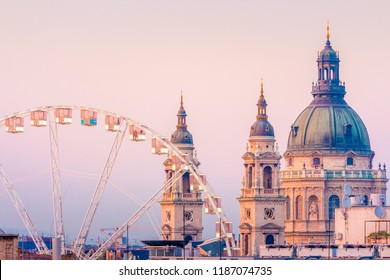 Budapest Eye And Basilica During Sunset Hour