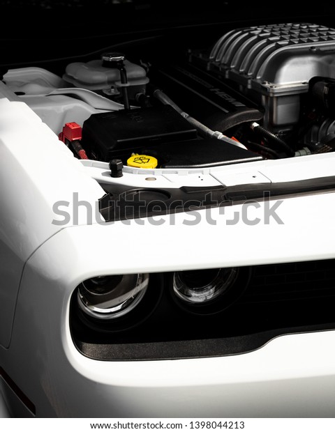 Budapest / Hungary - 05.01.2019.: A white\
Dodge Challenger\'s engine\
compartment.