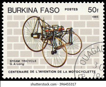 BUDAPEST, HUNGARY - 18 march 2016:  a stamp printed in Burkina Faso shows image of a vintage motorcycle, Stem Tricycle, G.A. Long, circa 1985