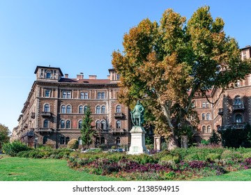 Budapest, Hungary - 6 October 2018: Beautiful old painted buildings at Kodaly Korond, a square on the intersection of Andrassy Ave and Szinyei Merse utca.