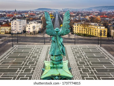 Budapest, Hungary - Aerial panormaic view of the famous Heroes' Square and Andrassy street on a cloudy spring day. The square and the streets are totally empty due to the covid-19 Coronavirus disease