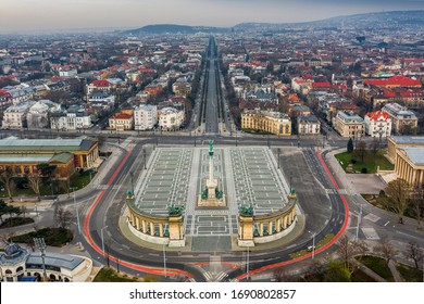 Budapest, Hungary - Aerial view of the totally empty Heroes' Square, Andrassy street and Dozsa Gyorgy street on a Spring morning. The square is empty due to the 2020 Coronavirus pandemic quarantine