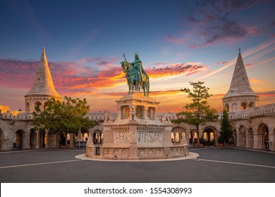 Budapest, Hungary - Amazing golden sunrise over Fisherman's Bastion with King Saint Stephen statue and an amazing colorful sky at autumn - Shutterstock ID 1554308993