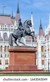 Budapest/ Hungary- August 10 2019: Statue Of Gyula Andrassy (man On Horse) And Hungarian Parliament Building. 