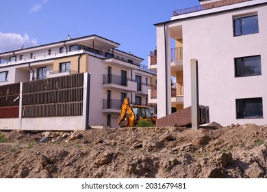 Budapest, Hungary - August 26, 2021: Construction Of Residential Apartment Row House With A Working Machine In Budapest Suburb