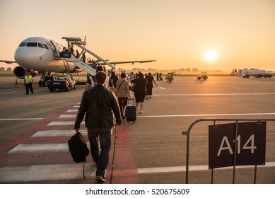 BUDAPEST, HUNGARY, August 4 2015 Passengers Line Up For Boarding Next To A Wizz Air Airplane At The Liszt Ferenc Airport.