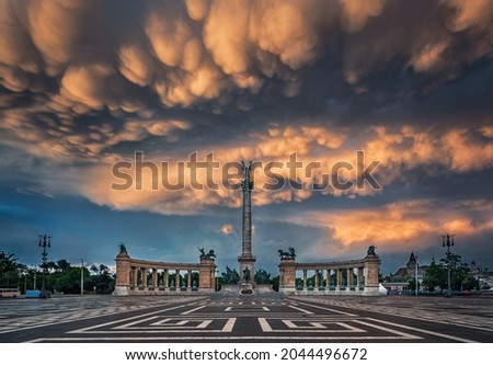 Budapest, Hungary - The beautiful Heroes' Square Millennium Monument at Budapest after a heavy thunderstorm with unique mammatus clouds on a summer afternoon sunset