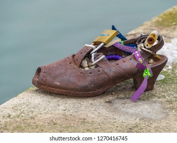 Budapest, Hungary - December 19, 2018: Shoes On The Danube Shore Are A Monument Created In Memory Of The Jews Killed During The Second World War By The Arrow Cross Party Soldier's Between 1944-1945.