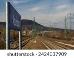 Budapest, Hungary - February 10, 2024: Aquincum train station. Beautiful blurry hilly view on the background.