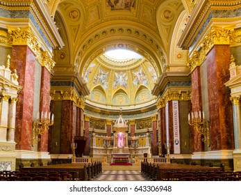 BUDAPEST, HUNGARY - FEBRUARY 22, 2016: Interior of the roman catholic church St. Stephen's Basilica. Ceiling, sanctuary and altar. Budapest, Hungary