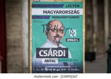 BUDAPEST, HUNGARY - FEBRUARY 27, 2022: Poster of egysegben magyarorszagert, or united hungary, the opposition party for the 2022 hungarian elections, defaced with antisemitic inscriptions.