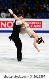 BUDAPEST, HUNGARY - JANUARY 15, 2014: Charlene GUIGNARD / Marco FABBRI Of Italy Perform Short Dance At ISU European Figure Skating Championship In Syma Hall Arena.