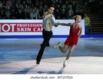 BUDAPEST, HUNGARY - JANUARY 19, 2014: Tatiana VOLOSOZHAR / Maxim TRANKOV Perform During The Exhibition Gala At ISU European Figure Skating Championship In Syma Hall Arena.