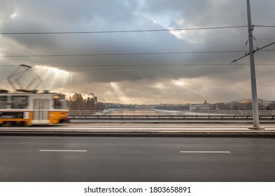 Budapest, Hungary - January 2, 2011: Looking South Along The Danube From The Árpád Bridge, With Tram Crossing Bridge, With Margaret Island In The Background.